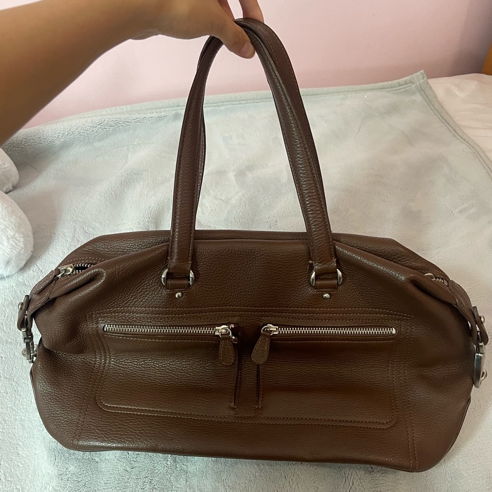 brown ghurka bag